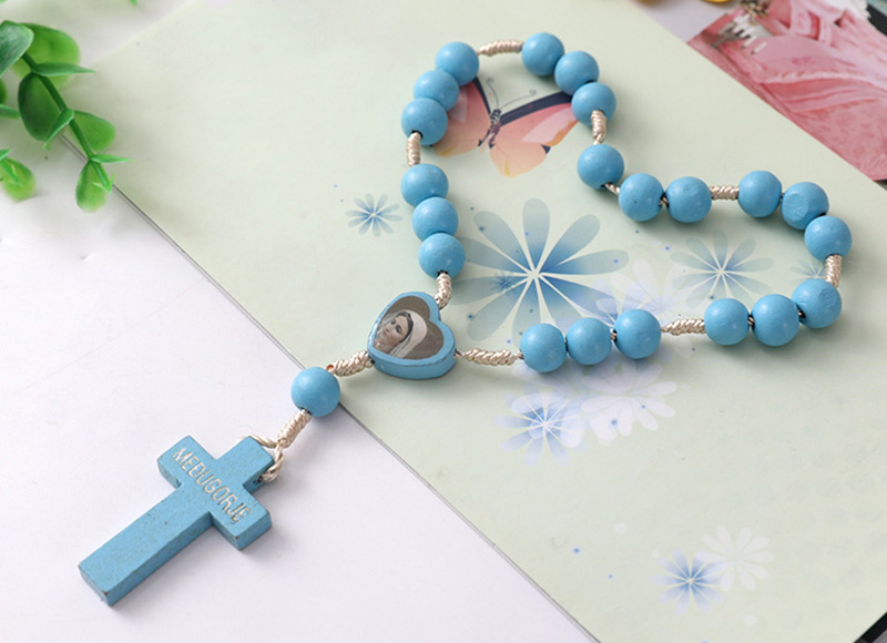 Blue wood rosary with heart shape bead